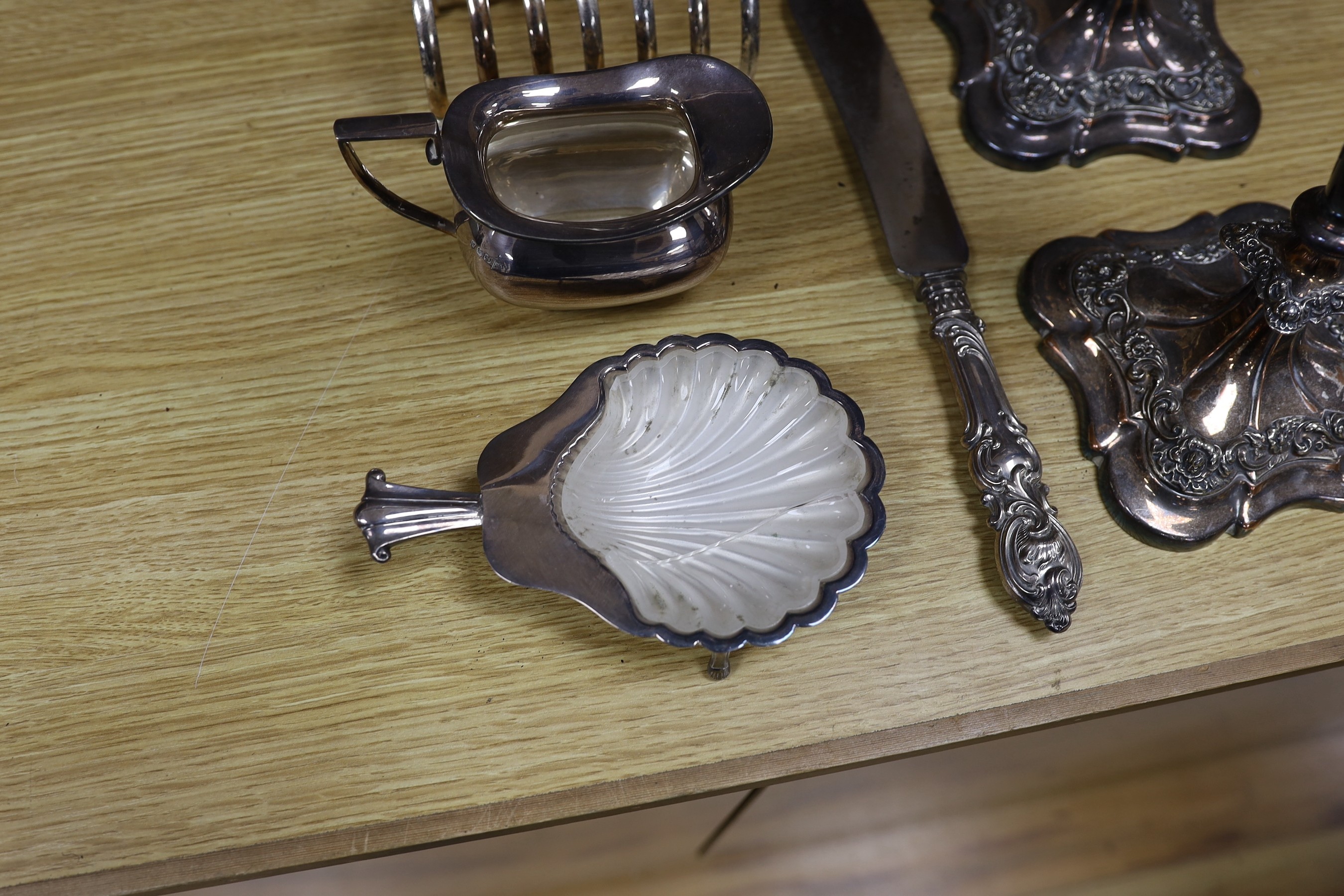 Assorted plated wares including a pair of three light candelabra, 52cms high